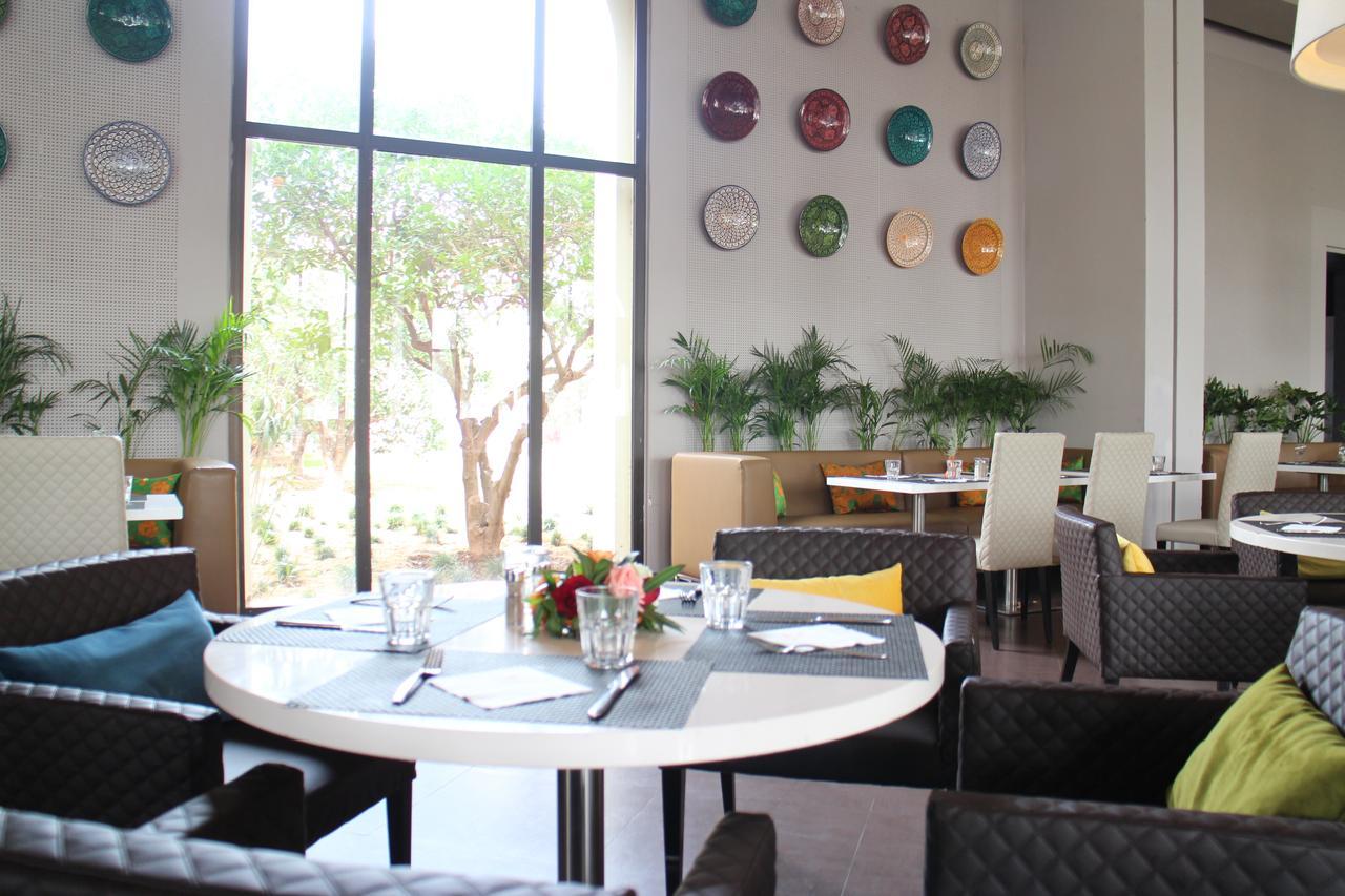 Kenzi Club Agdal Medina - All Inclusive Lahebichate Bagian luar foto The interior of the restaurant